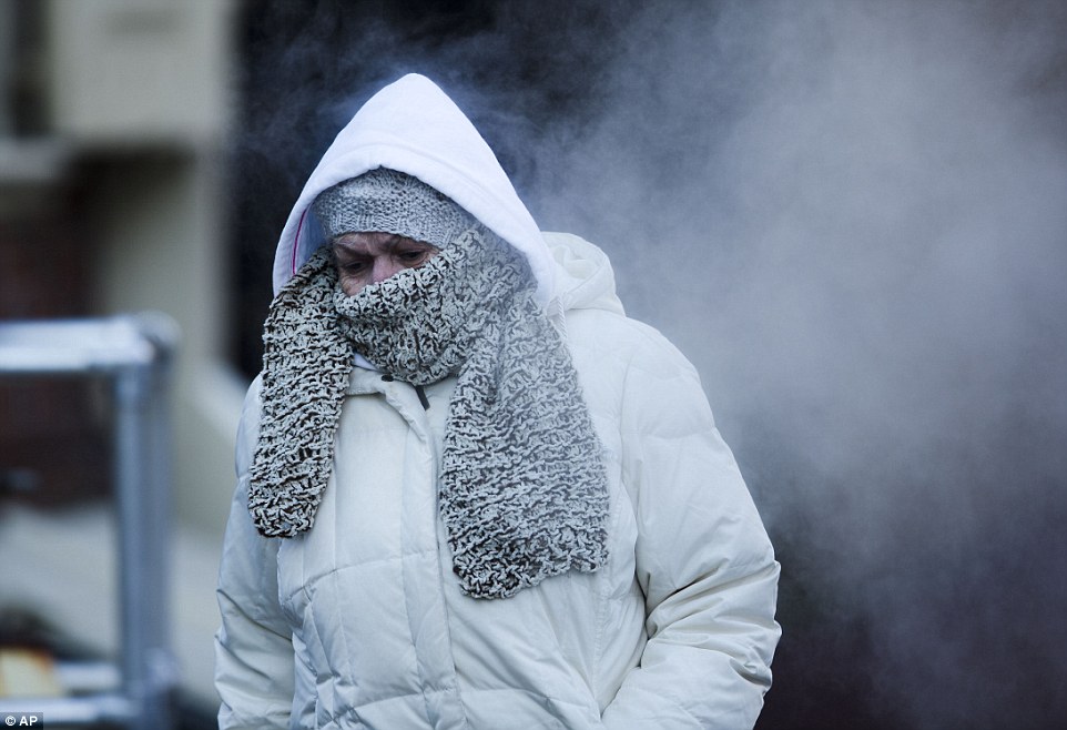 234576b800000578-2838901-bitter_cold_commuters_across_the_country_had_to_bundle_up_agains-24_1416335714961